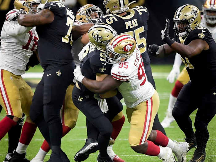 49ers DT Kentavius Street hits Saints QB Drew Brees during a 2020 game between New Orleans and San Francisco. Brees sustained a rib injury on the play. Credit: Nola.com
